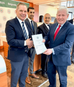 Dr Hugh Milroy CEO of Veterans Aid receiving an award from WVF President Mr Dan-Viggo Bergtun