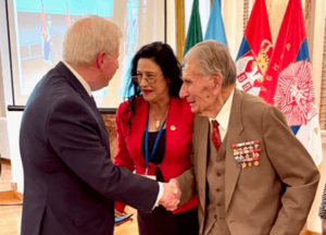 CEO of Veterans Aid (left) Dr Hugh Milroy meets 97-year-old Professor Zbornik Radova, former partisan, soldier and distinguished military historian at the 30th World Veterans Federation Assembly in Belgrade, Serbia
